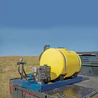 Small skid sprayer with a yellow tank on the back of a work truck
