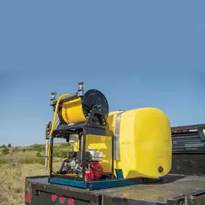 Poly skid sprayer on the back of a work truck